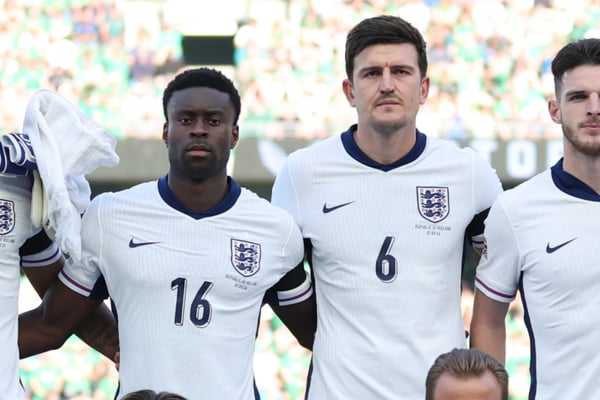 马克·盖伊（左）和哈里·马奎尔（右）两人同时代表英格兰队出场仅八次。/ Carl Recine/Getty Images