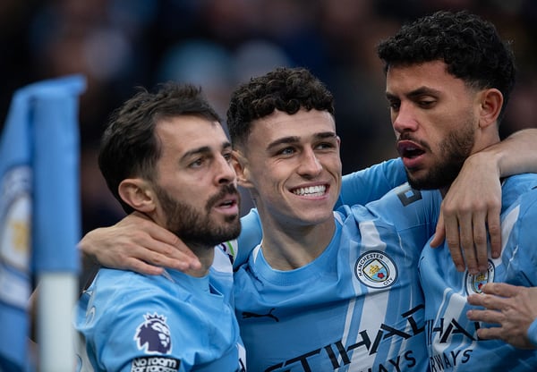 菲尔·福登（中）帮助曼城重回冠军争夺行列。/ Visionhaus/Getty Images
