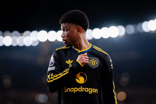 世界杯FIFA体育新闻：阿马德·迪亚洛笑到了最后。/ Ash Donelon/曼联/Getty Images