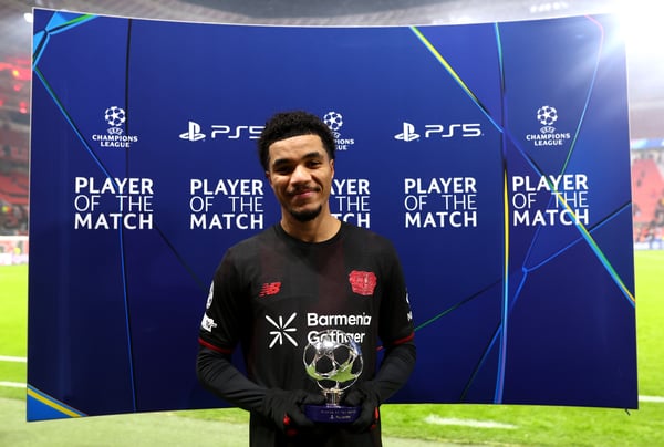 世界杯FIFA体育新闻：马利克·蒂尔曼在欧冠联赛对阵比利亚雷亚尔的比赛中梅开二度，荣膺全场最佳球员。/ Jörg Schüler/Bayer 04 Leverkusen/Getty Images