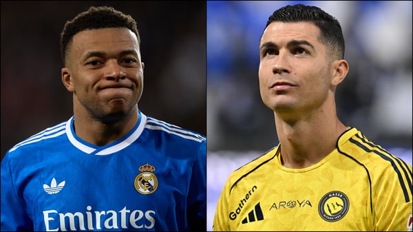 世界杯FIFA体育新闻：基利安·姆巴佩正在皇家马德里追赶克里斯蒂亚诺·罗纳尔多的进球纪录。/ Omar Arnau/Quality Sport Images/Mohammed Saad/Anadolu/Getty Images