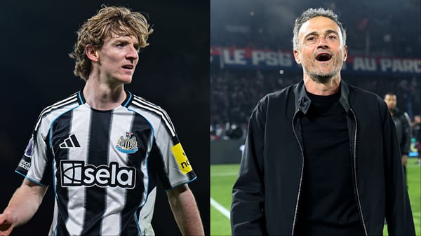 世界杯FIFA体育新闻：安东尼·戈登（左）和路易斯·恩里克成为今日八卦新闻的头条。/ Serena Taylor/纽卡斯尔联/Getty Images，Lars Baron/UEFA/Getty Images