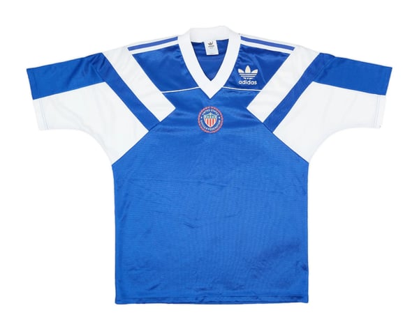 世界杯FIFA体育新闻：美国男足国家队1990年意大利世界杯客场球衣。/ 足球装备档案