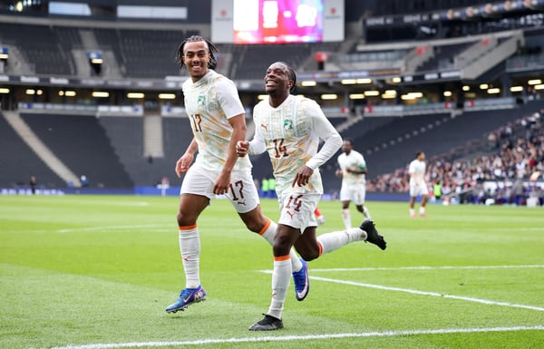 世界杯FIFA体育新闻：2026年3月，在米尔顿凯恩斯的MK体育场举行的国际友谊赛中，马夏尔·戈多为科特迪瓦队攻入一球，对手是韩国队。图为戈多进球后庆祝。